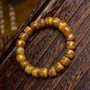 Tibetan-Style Old Copper Swastika Inlay Yak Bone Bracelet – Traditional Handcrafted Design